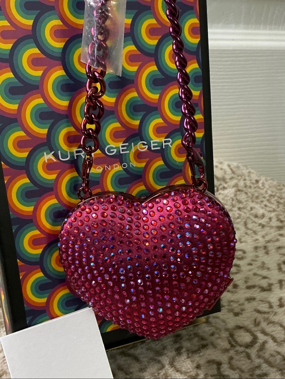 Kurt Geiger London Micro Heart Clutch Bag, Covered in Sparkling Pink Crystals - Picture 2 of 6
